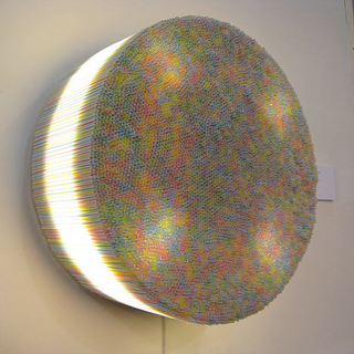 Illustration for article titled The Thousand and One Drinking Straw Lamp